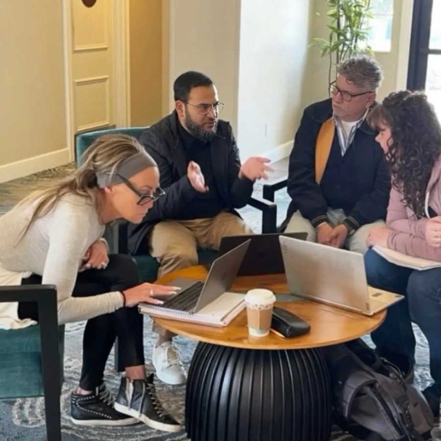 Muhammad working with business owners in San Diego
