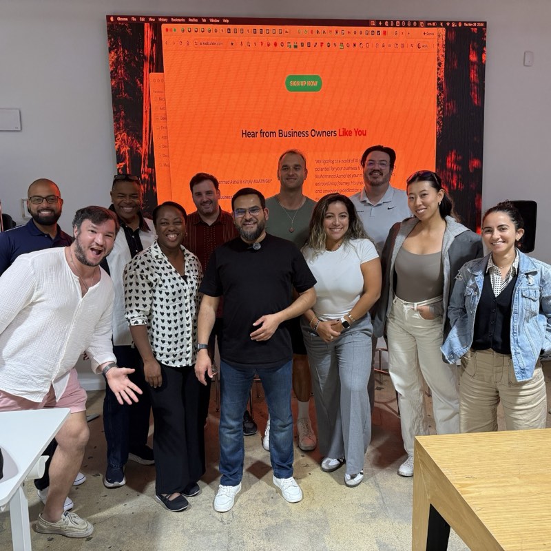 Muhammad with workshop attendees in Miami